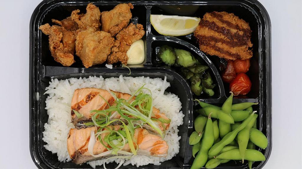 Salmon Shioyaki Bento  · Grilled salted salmon over rice, fried boneless chicken, clam chowder croquette, and edamame
