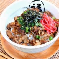 Chashu Bowl · Chopped pork belly over rice. Green onion, sesame seeds, pickled ginger and nori seaweed.