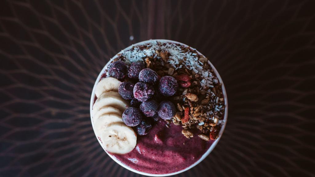 Acai Bowl · Acai, strawberries, banana, coconut water, topped with gluten-free granola, blueberries, banana, and coconut flakes