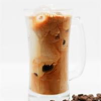 Iced Mocha · Enjoy a double shot of Red Bay espresso, milk, raw cacao, and coconut sugar over ice