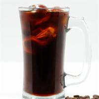 Iced Americano · Enjoy a double shot of Red Bay espresso topped with cold water over ice