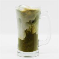 Iced Matcha Latte  · Organic matcha and steamed milk, lightly sweetened with honey served over ice