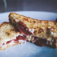 Sweet Grilled Cheese · Gluten-free bread, organic pepper jack cheese, goat cheese, and fig jam. Served with green s...