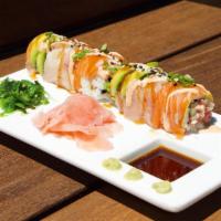 Town Super Roll · Spicy sashimi-grade ahi tuna, avocado, cucumber, topped with thinly sliced salmon, dynamite ...