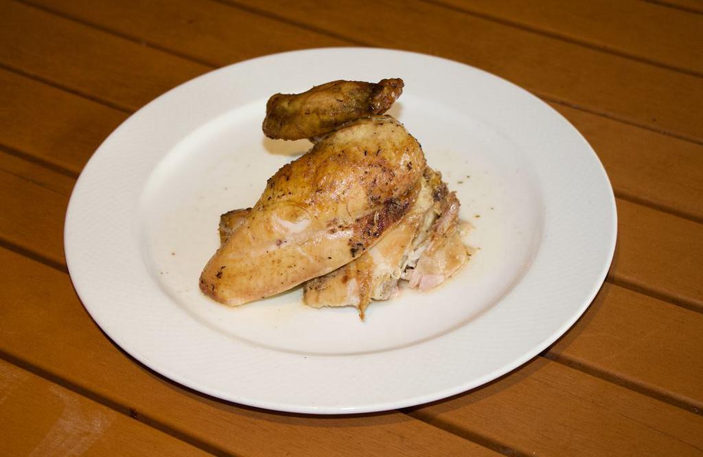 Spit Fire Roasted Pitman Farms Chicken · Free Range Mary’s herb marinated chicken, choose two of our signature sides