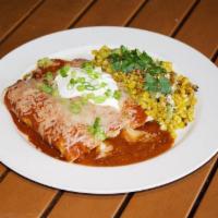Spit Fire Roasted Chicken Enchiladas · rotisserie chicken & melted cheese, house red sauce, sour cream and a side of Town spicy col...