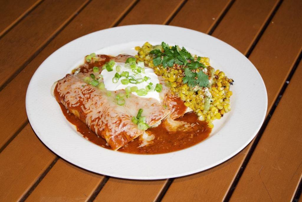Spit Fire Roasted Chicken Enchiladas · rotisserie chicken & melted cheese, house red sauce, sour cream and a side of Town spicy coleslaw