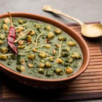 Palak Cholay · Fresh spinach cooked with garbanzo beans.