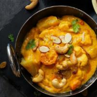Nau Ratan Korma · Fresh vegetables cooked with cheese, herbs and spices.