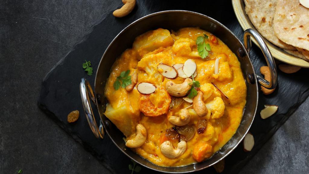 Nau Ratan Korma · Fresh vegetables cooked with cheese, herbs and spices.