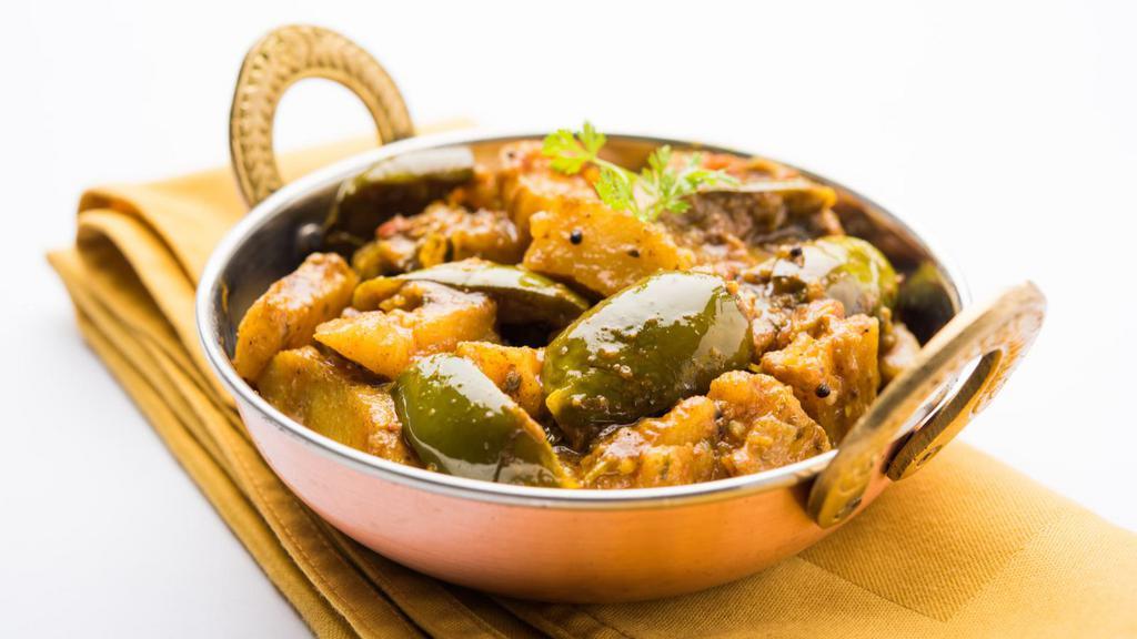 Aloo Baingan · Delicious potatoes and eggplants cooked with herbs and spices.
