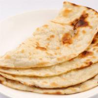 Roti Naan · Fresh whole wheat bread baked in clay oven.