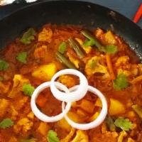 Veg Kolhapuri · Mixed vegetables curry with onion, tomatoes,  capsicum, beans, cauliflower, coriander leaves...