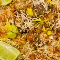 Goat Kheema Biryani · Spicy rice with minced goat and spices, Maharashtra style with side goat curry.