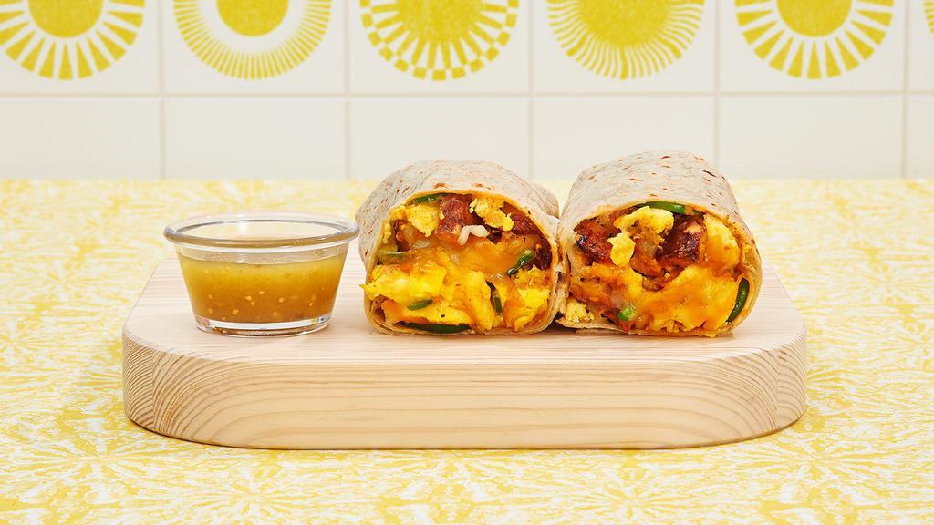Spicy Hot Breakfast Burrito · Two scrambled eggs, jalapenos, breakfast potatoes, pico de gallo, sriracha and melted cheese wrapped in a fresh flour tortilla.