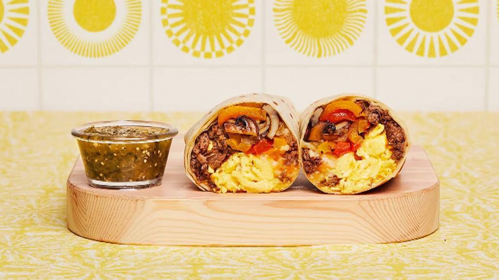 Philly Cheesesteak Breakfast Burrito · Two scrambled eggs, chopped steak, grilled onions and peppers, sauteed mushrooms, and melted cheese wrapped in a fresh flour tortilla.