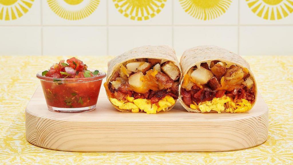 Chicken Sausage Breakfast Burrito · Two scrambled eggs, chicken sausage, breakfast potatoes, and melted cheese wrapped in a fresh whole wheat wrap