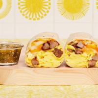 Steak Breakfast Burrito · Two scrambled eggs, home fries, grilled steak, and melted cheese wrapped in a fresh flour to...