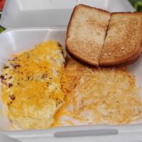3 Meat Omelette · ham, bacon, sausage and cheddar cheese omelette with hash browns and toast