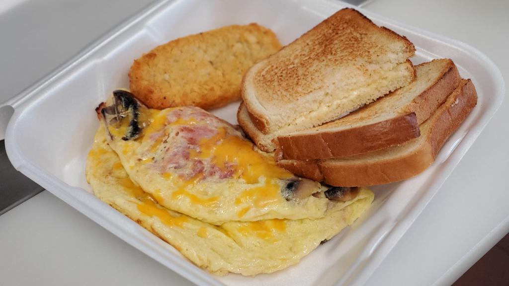 Denver Omelette · Ham, onions, bell peppers, cheddar cheese omelette with hash browns and toast