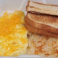 Cheddar Cheese Omelette · egg and cheddar cheese omelette with hash browns and toast