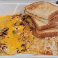 Meat Lover Omelette · Sausage, bacon, ham, bell peppers, mushrooms, onions and cheddar cheese served with toast an...