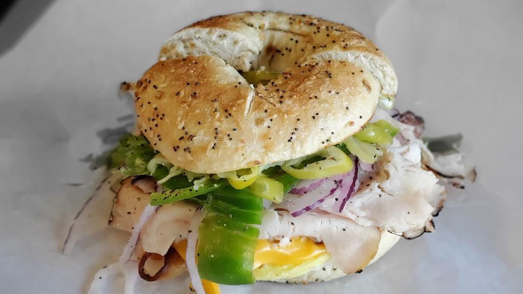 Turkey, Sausage & Egg · Turkey, egg, sausage on your choice of bagel with sauce, cheese and veggies