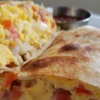 Combination Burrito · Scrambled eggs, sausage, ham, tomato, onion, Mozzarella cheese and hash browns wrapped in a ...