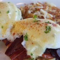 Scotty Benedict · English muffin, bacon, tomato, poached egg, hollandaise sauce.