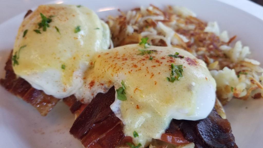 Scotty Benedict · English muffin, bacon, tomato, poached egg, hollandaise sauce.