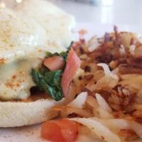 Vegetarian Benedict · English muffin, spinach, tomato, poached egg, hollandaise sauce.