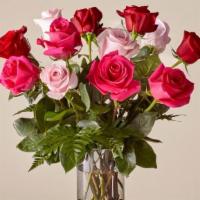 Rose Colored Love · This elegant, sophisticated bouquet combines classic Valentine's Day roses with a pop of col...