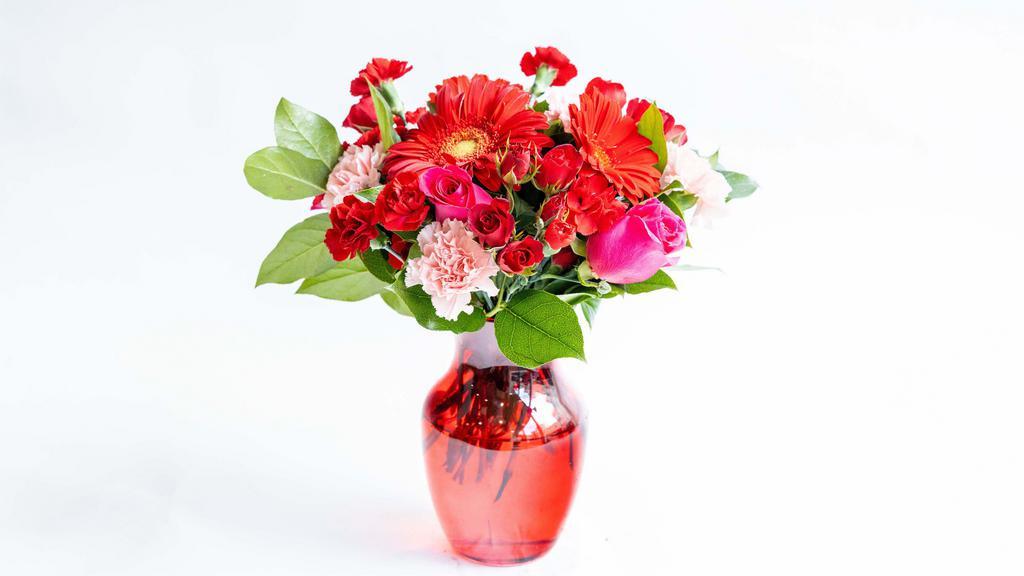 The Valentine · Let your special someone know how you feel with this elegant bouquet. Two colors of roses, carnations & more flowers make a bold statement of your love for Valentine's Day.