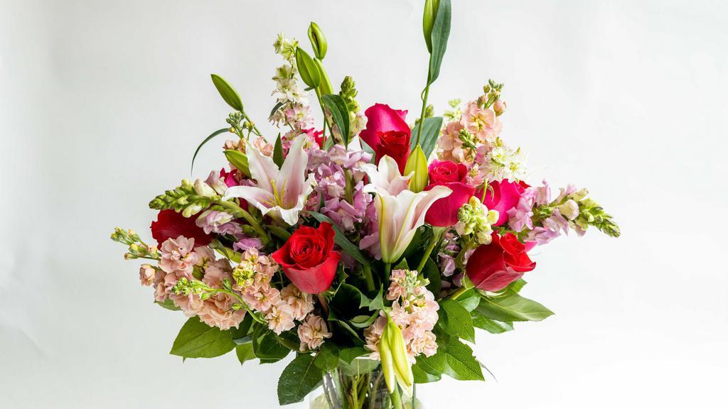 You And Me Luxury Bouquet · It's the season of love, and this bouquet is the bold, romantic gesture you're looking for. Three colors of roses (red, pink & hot pink) mixed with hydrangea, snapdragons & more flowers in a glass vase is the perfect way to remind your love that you were meant to be together.
