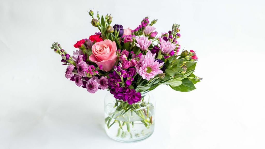 Sweet Thing · Love is sweet, love is bright, & love is unique. Remind your Galentine, mom, or someone special that you love them with this beautiful bouquet featuring carnations, pompons & more beautiful flowers in a clear glass vase.