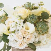 Laguna Beach · White Hydrangea, Roses and more are arranged in a wooden cube.
