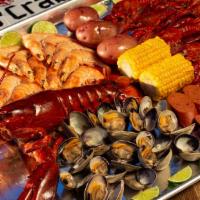 C4. Lobster Combo · Includes 1 lb. Shrimp (head on), 1 lb. Clams, 1 lb. Crawfish, 2 corns, 2 potatoes and 4 saus...