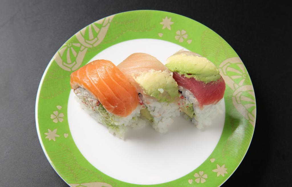 Rainbow Roll (9 Pcs) · 9 pieces. Imitation crab avocado roll topped with assorted fish.