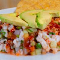 Shrimp Ceviche · Shrimp cooked with lime, onion, tomato, cucumbers with sliced avocado on top