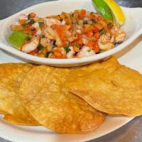 Shrimp Cocktail · Gluten-Free. Mexican style, prawns cooked in our special sauce with diced tomatoes, avocado,...