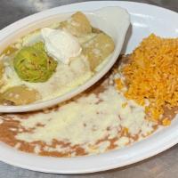 Enchiladas in Salsa Verde · Gluten-Free. Two corn tortillas, filled with your choice of meat, covered with tomatillo sau...