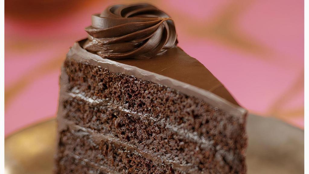 Chocolate Mousse Cake · Three layered Chocolate Mousse cake with rich chocolate icing.