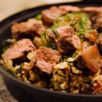Steak Fried Rice · CAB Prime New York / shiitake mushrooms / green onions / Brussels
sprouts