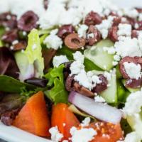 Greek Salad · Mixed greens, feta cheese, kalamata olives, bell pepper, tomatoes, onions & cucumber.