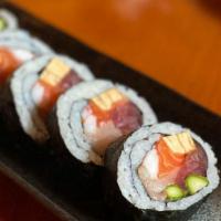Futomaki · salmon, hamachi, tuna, tamago, tiger shrimp & asparagus roll