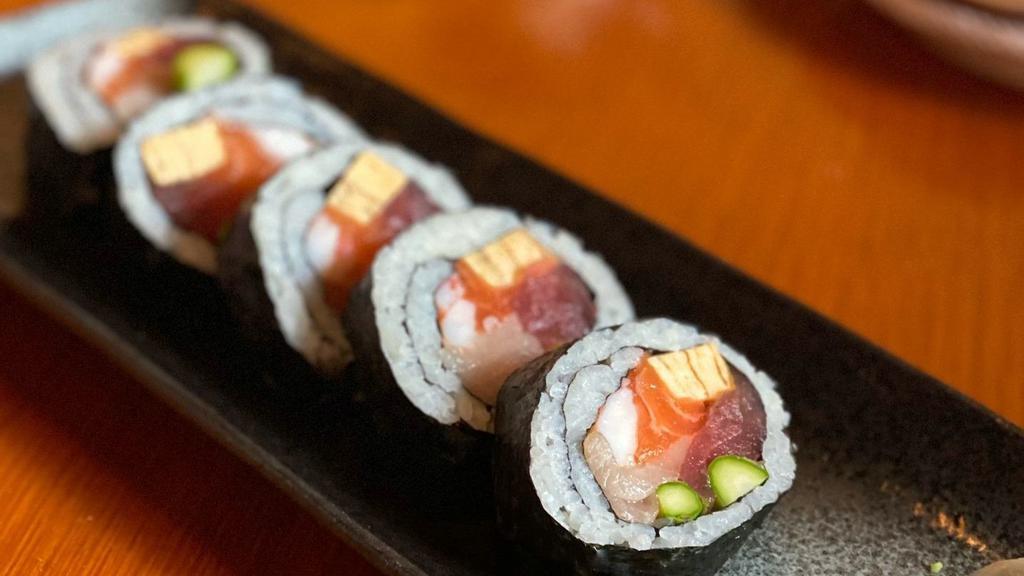 Futomaki · salmon, hamachi, tuna, tamago, tiger shrimp & asparagus roll