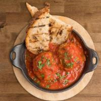 MEATBALLS · Two meatballs with spicy tomato sauce and grilled crostini. . Ingredients: pork/veal garlic,...