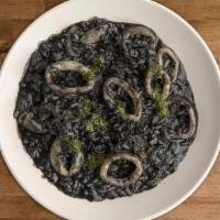 SQUID INK RISOTTO · carnaroli rice, onions, squid, and squid ink, white wine, lemon zest, butter, parmesan and s...