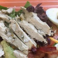 Cobb Salad · Most popular. Chicken breast strips, avocado, bacon, olives, cheese, hard-boiled egg and tom...