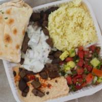 Gyros · Yee-ros, seasoned lamb and beef slowly cooked on a skewer, sliced and topped with tzatziki s...